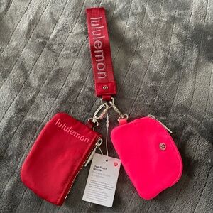 Lululemon Dual Pouch Wristlet Wallet red, and hot pink brand new with tags!